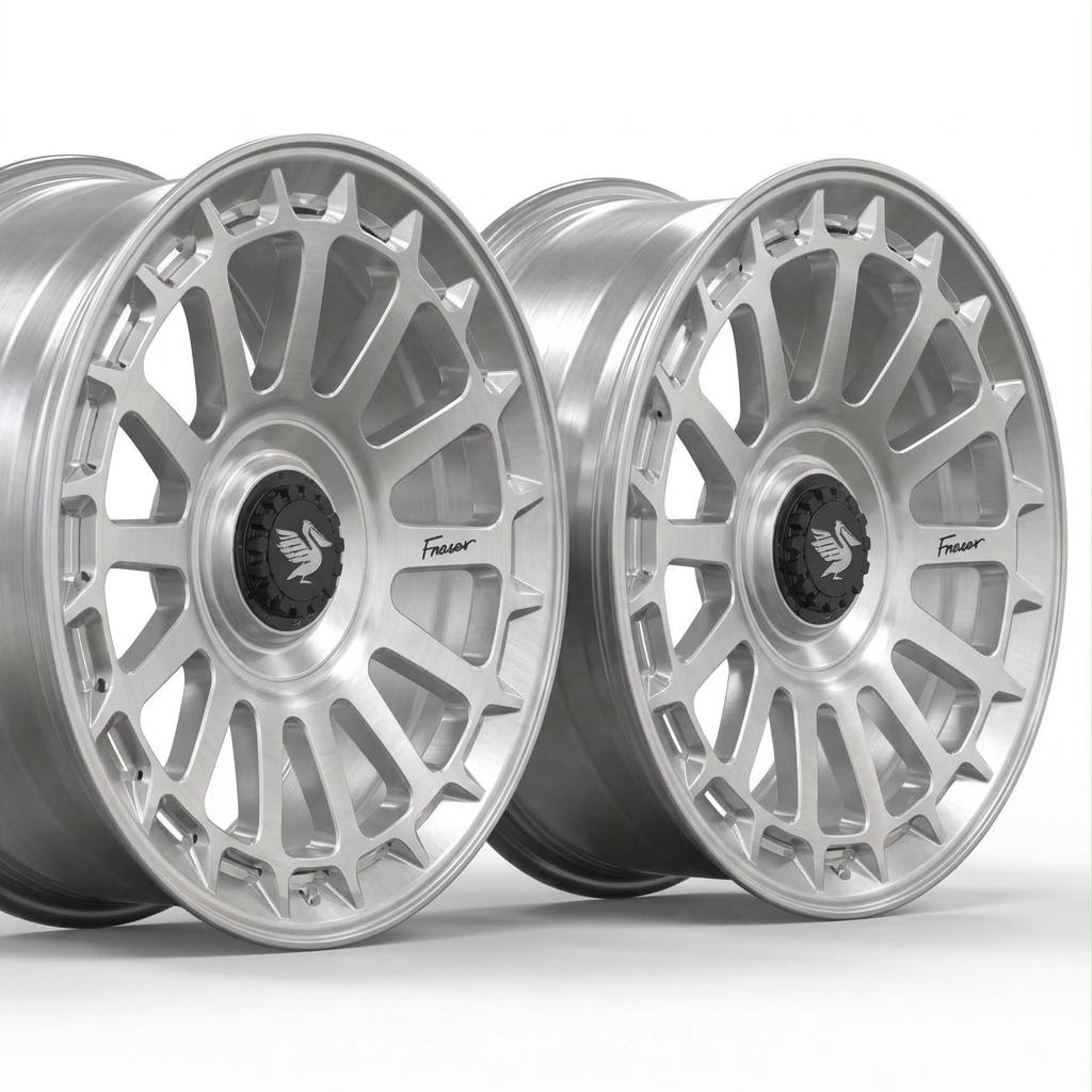 Massive 1 radial-spoke concept pair in brushed aluminium with deep sculpted windows